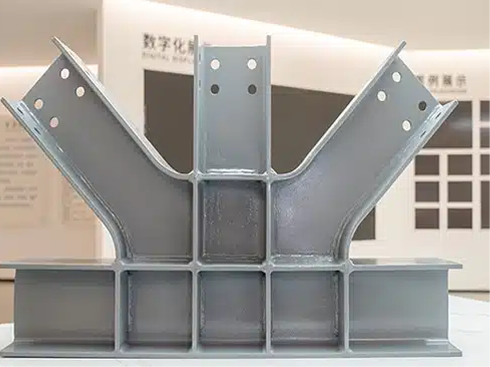 Fabricated steel beam connections with drilled bolt holes
