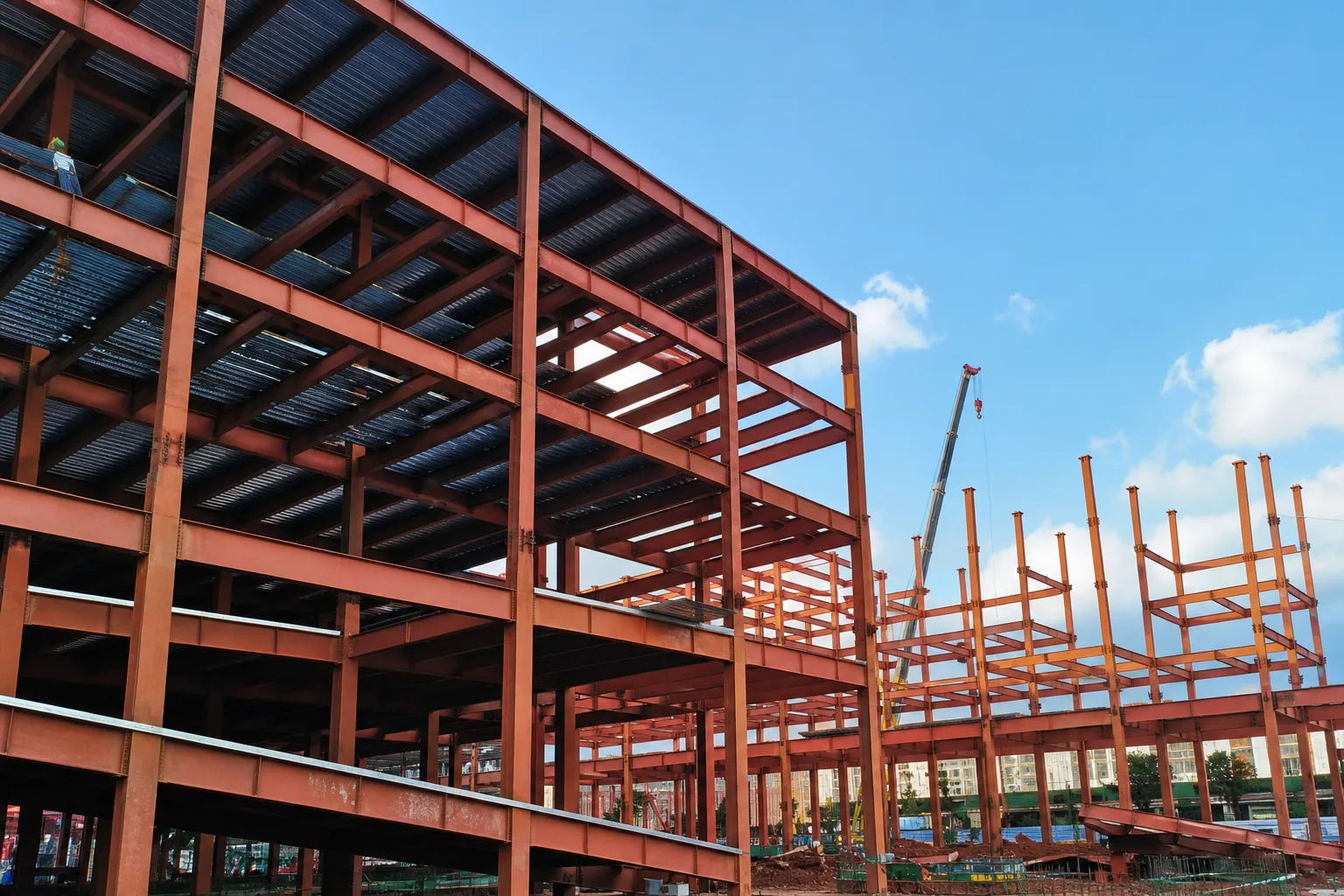 Red steel beams of the Zhejiang Runtong Auto Parts building under construction